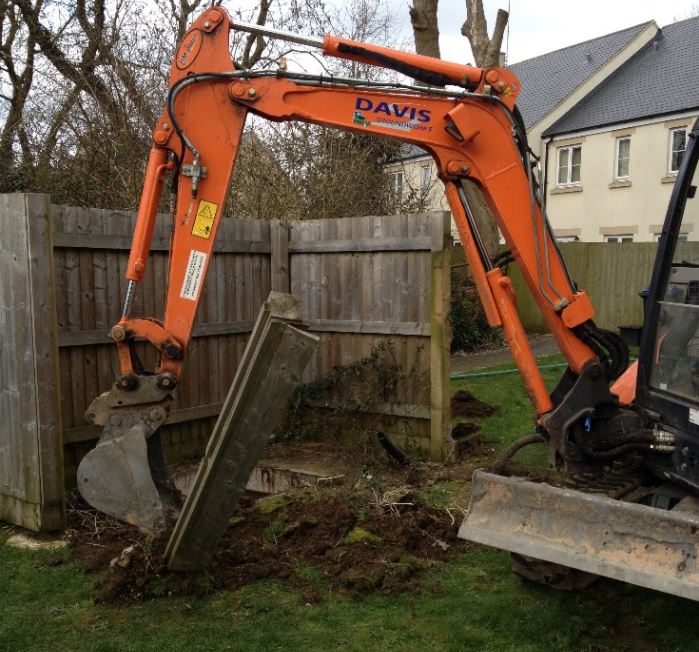 digger removing a failed package pump station